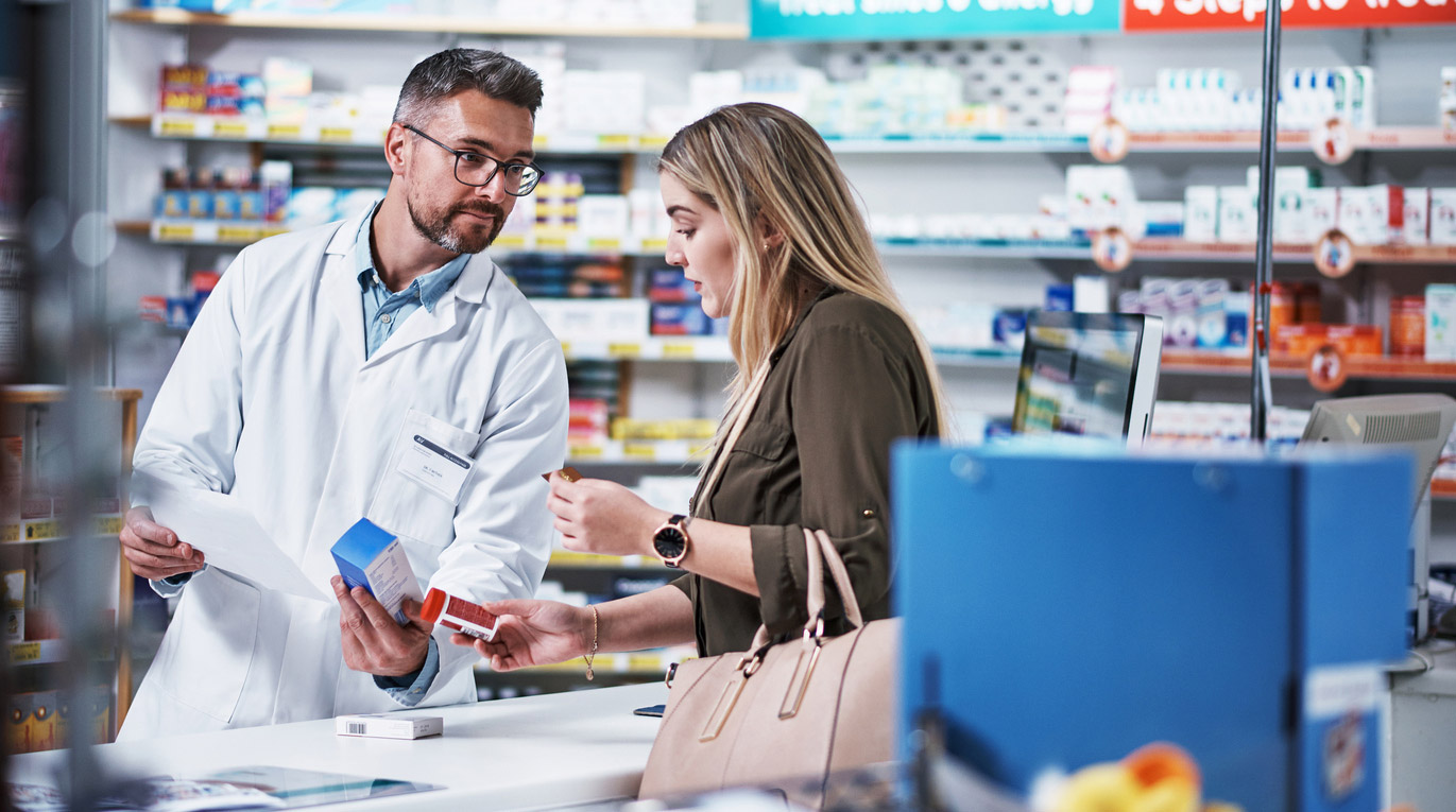 pharmacist talking to patient